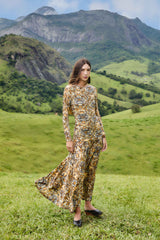 FARM Rio model wearing the Blue Winter Tapestry Long Sleeve Maxi Dress