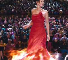 I remember my 13-year-old self being super pissed that they had put cgi-fire on her interview dress and not a fire pattern with jewels that revealed itself when she spun. Now that