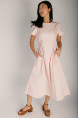 The Bryan Smocked Midi Dress in Pale Pink