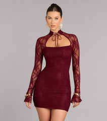 Add elegance to your look with the Got The Romance Lace Bodycon Mini Dress, a wine long sleeve dress featuring trendy sleeve details.