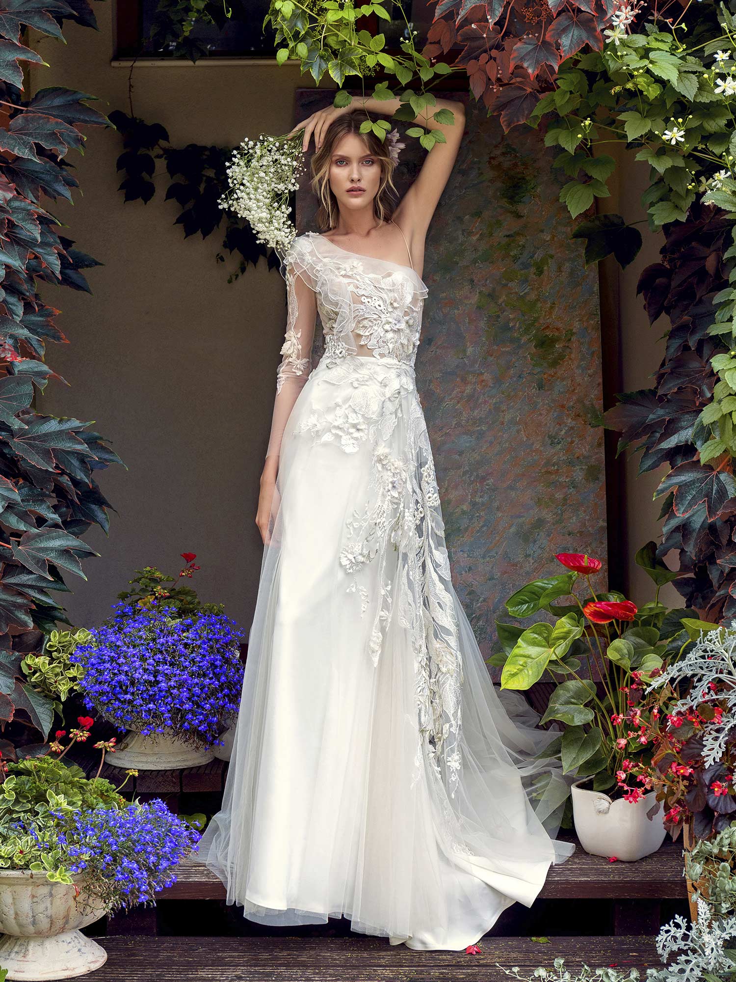 One-shoulder wedding dress with asymmetrical floral embroidery